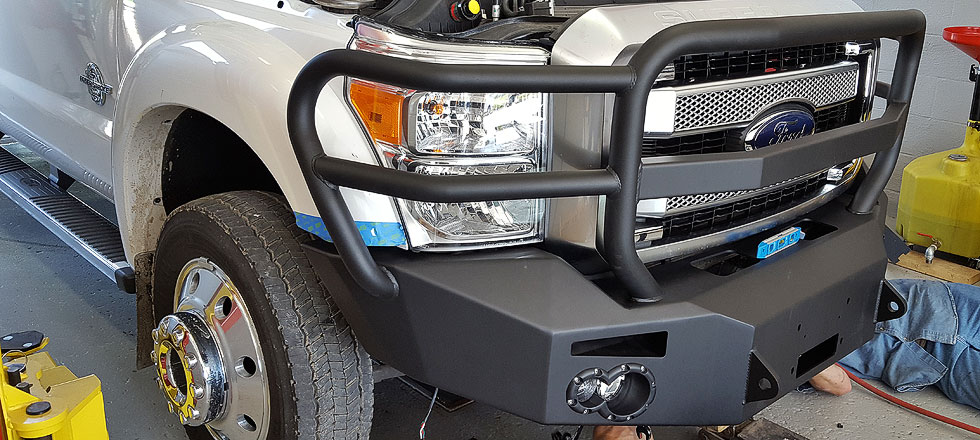 White truck with front bumper installed